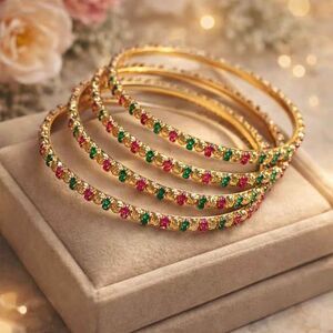 Gold color bangles set of 4 with green pink stones
